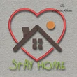 Stay Home embroidery design featuring a house inside a heart-shaped frame with decorative lettering