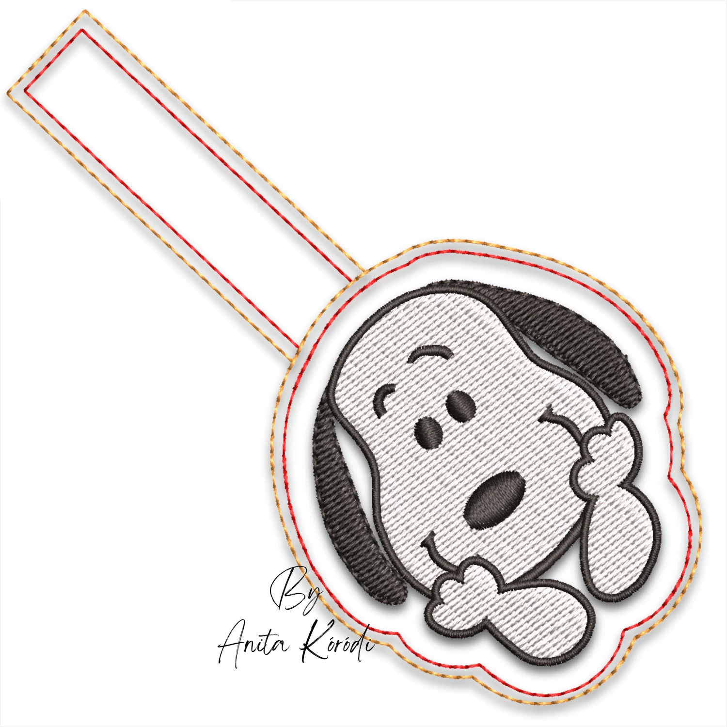Handmade cream faux leather Snoopy keychain with embroidered black and white Snoopy face and metal key ring